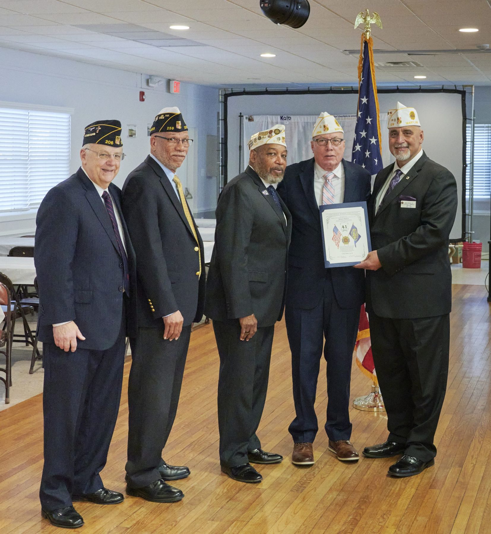 Post 206 officers presenting an award