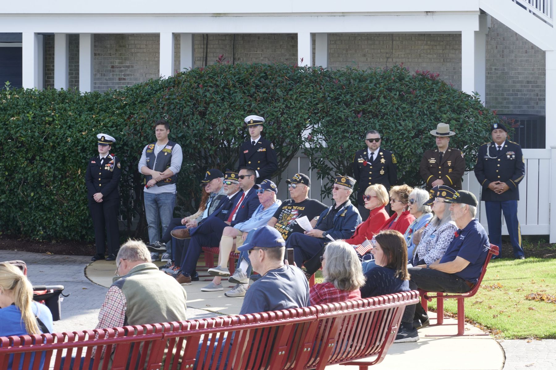 Veterans and families seated at the Veterans Day ceremony